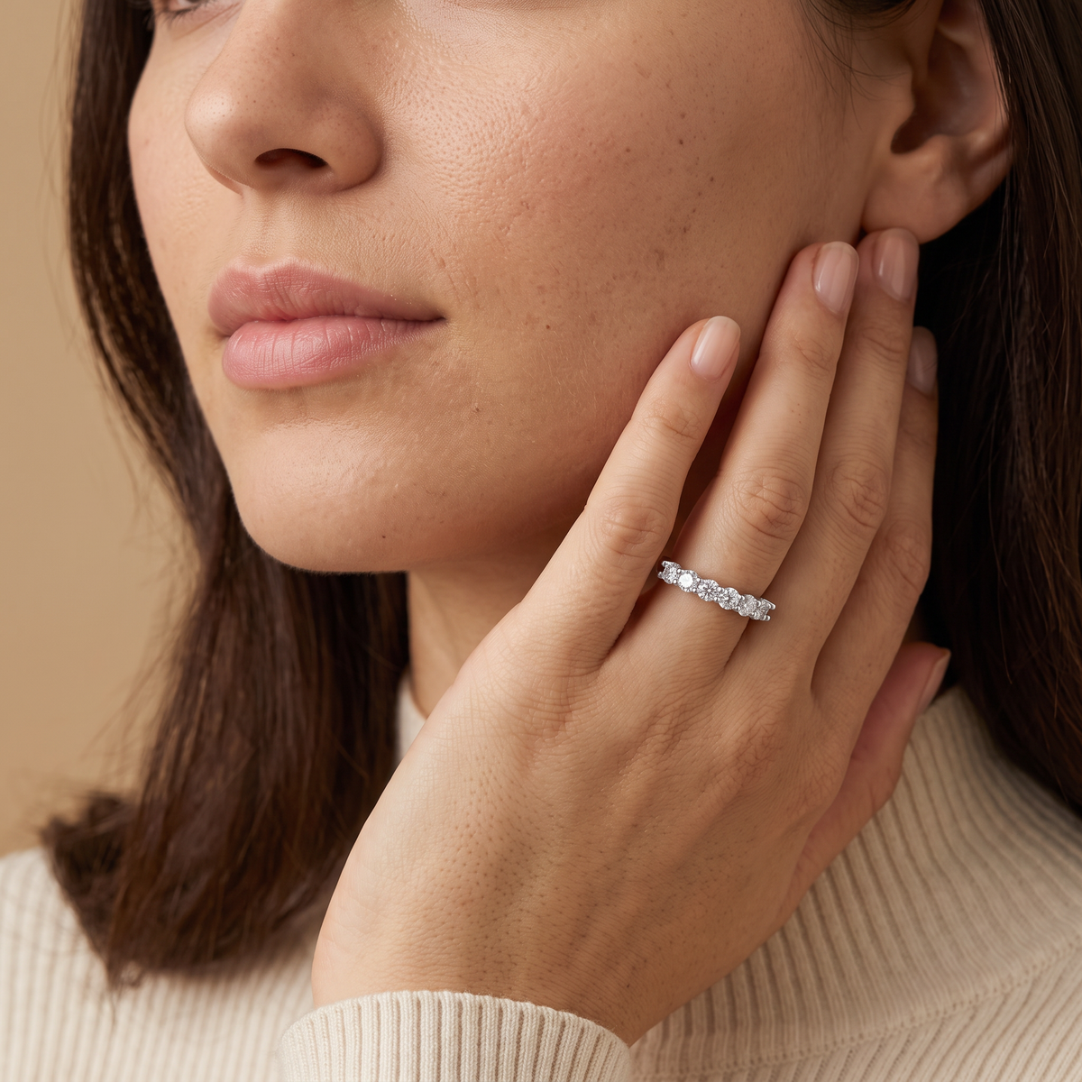 Sette Ring worn on the ring finger, close-up portrait