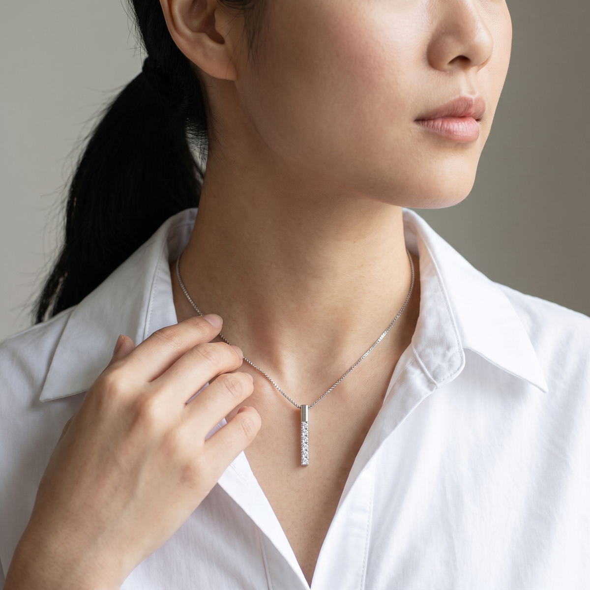 Linea Necklace worn, close-up portrait