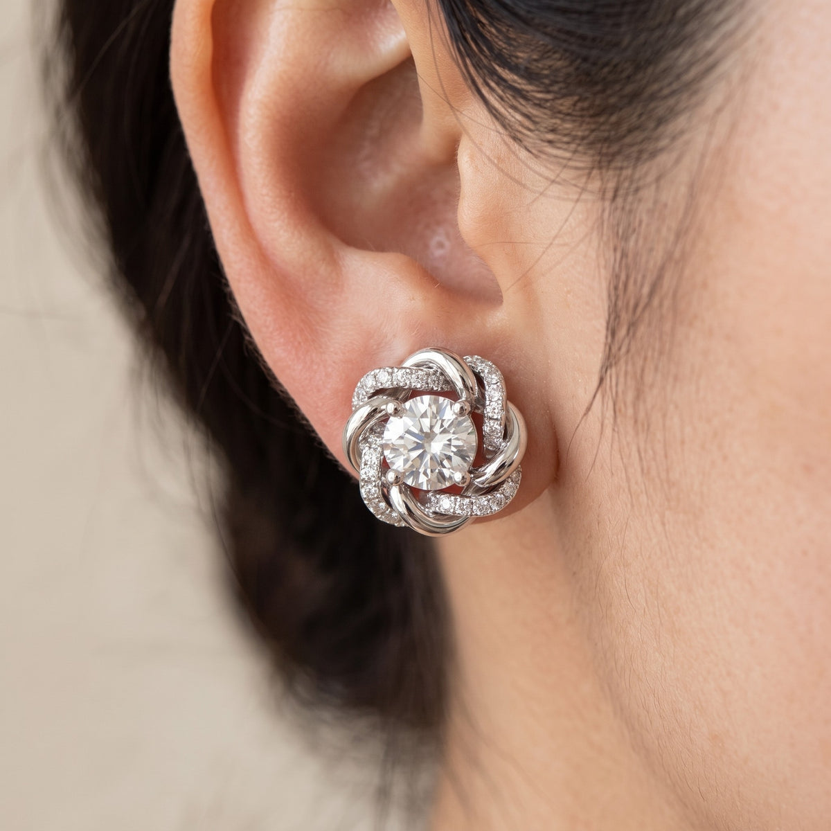 Fiore Stud Earrings worn on ear
