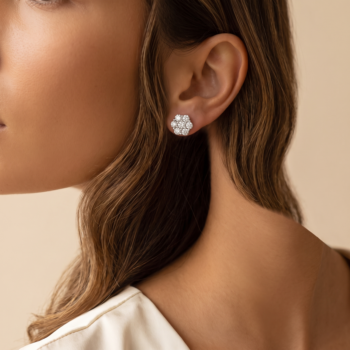 Dalia Stud Earrings worn, close-up portrait