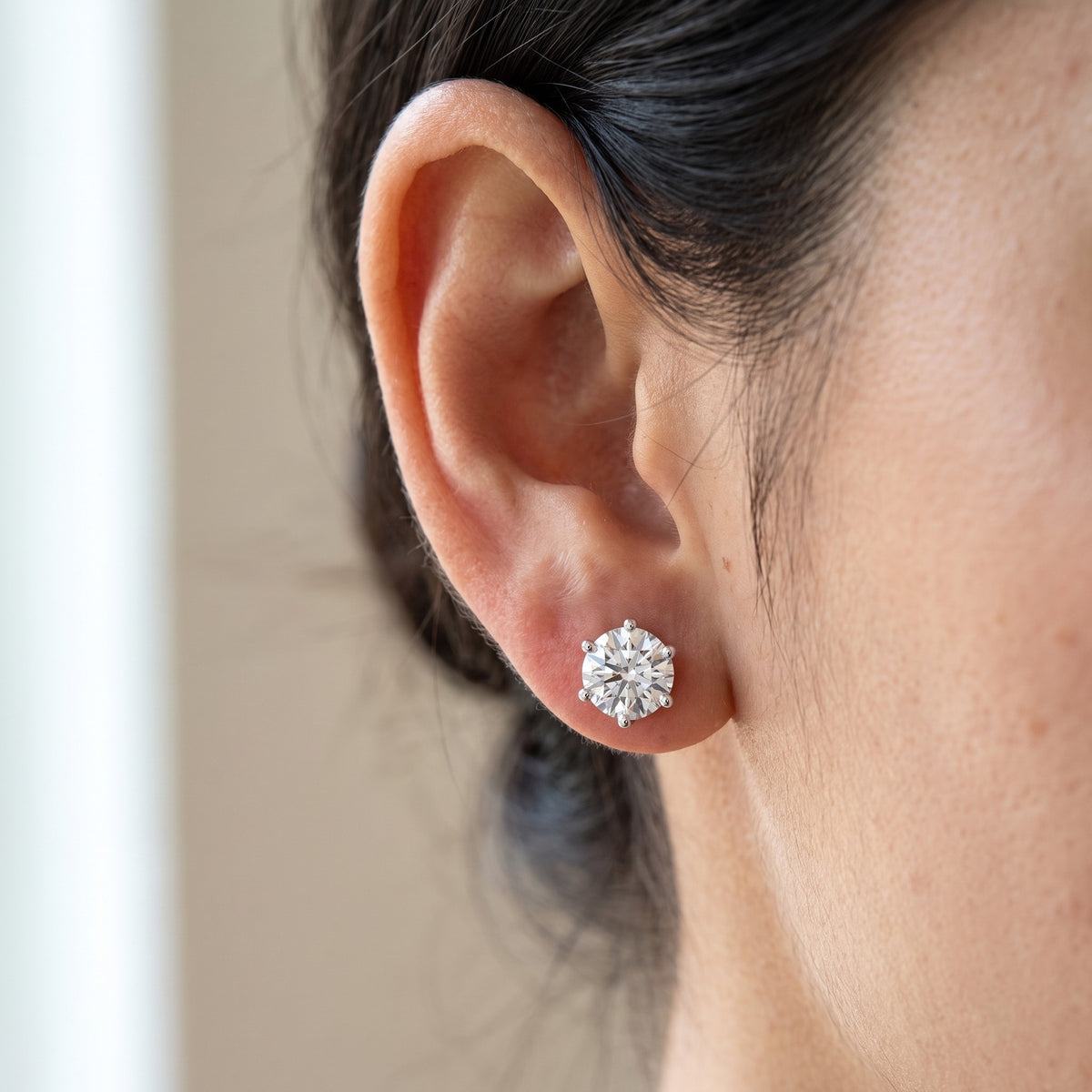 Prima Stud Earrings worn on ear